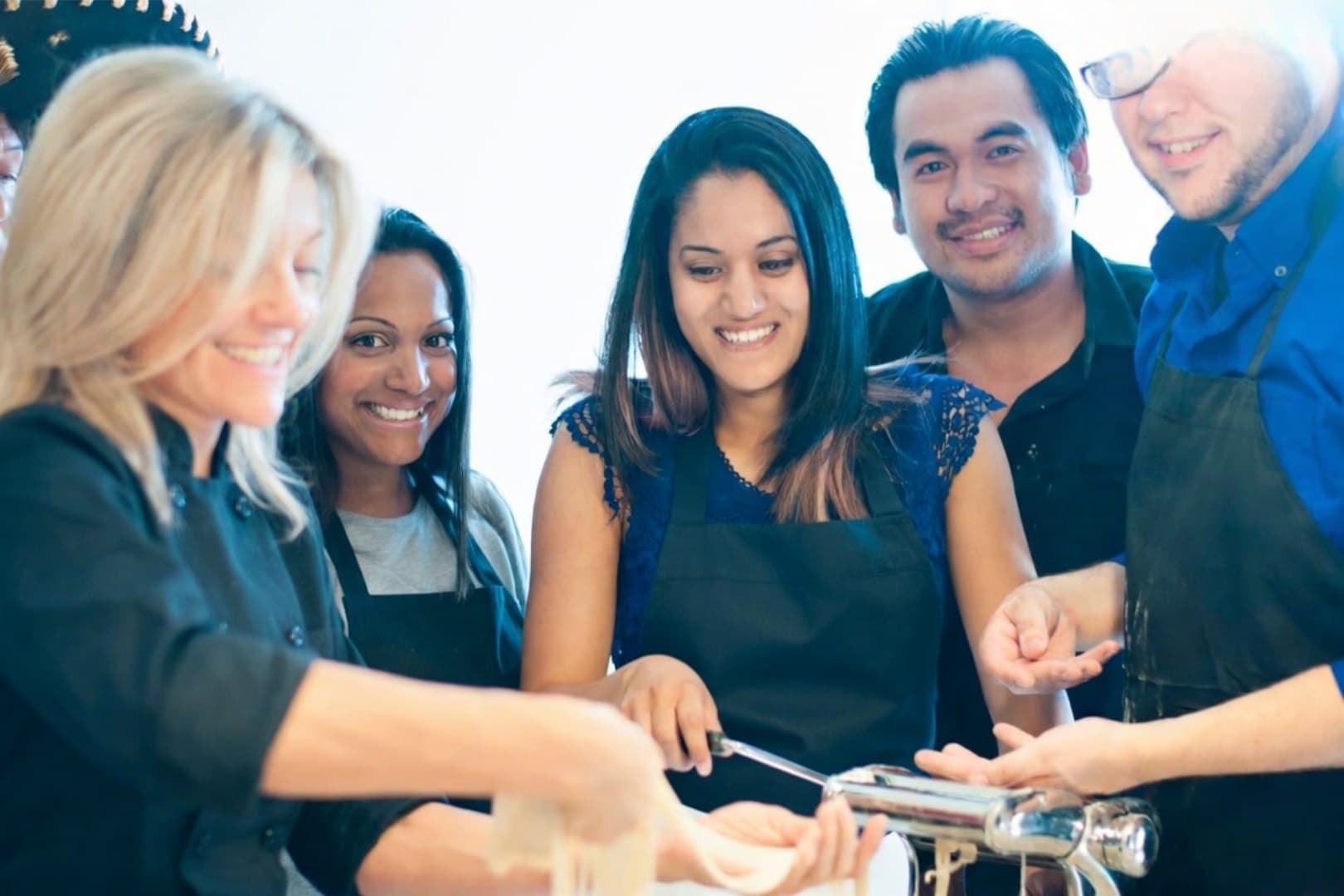 A group cooking together at a private class in Calgary