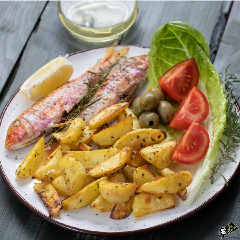 grilledfishwithroastedpotatoesandvegetablesontheplateredpictureid1202262739 The